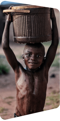 Child carrying container on head